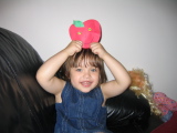 Jade with an apple on her head